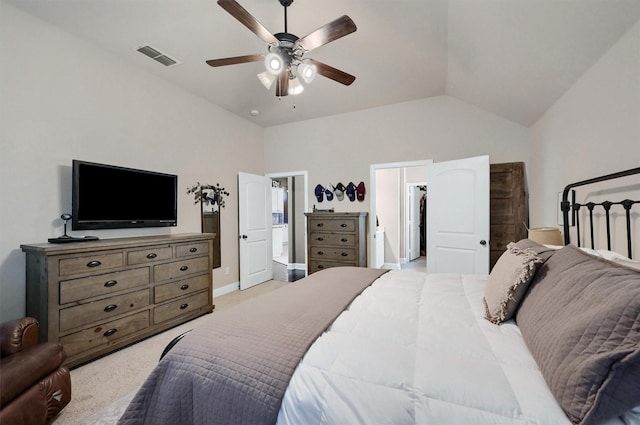 bedroom with ceiling fan, light colored carpet, visible vents, baseboards, and vaulted ceiling