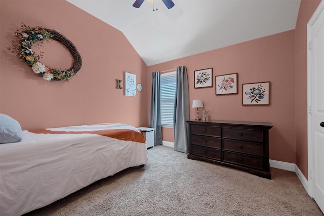 bedroom featuring lofted ceiling, carpet, a ceiling fan, and baseboards