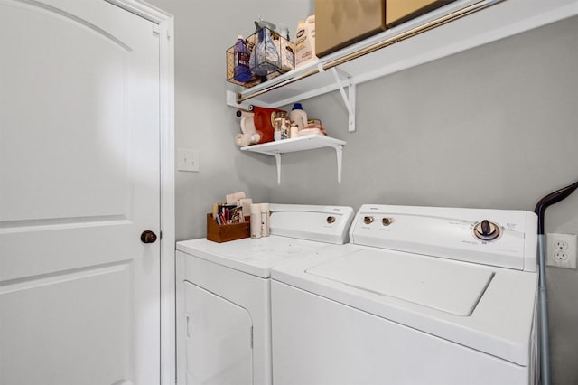 laundry room with laundry area and washer and clothes dryer