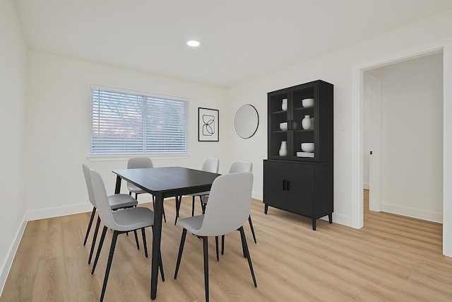 1907 Nevada St, Denton, TX 76209 - dining area featuring light wood-style floors, baseboards, and recessed lighting