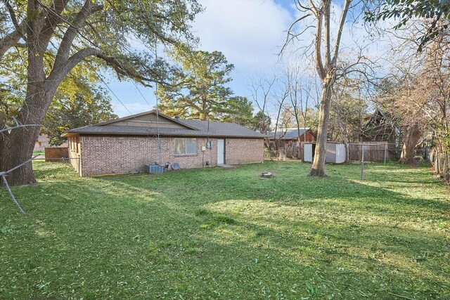 1907 Nevada St, Denton, TX 76209 - view of yard featuring a shed and an outdoor structure