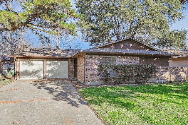 1907 Nevada St, Denton, TX 76209 - view of front of house featuring brick siding, concrete driveway, an attached garage, and a front lawn