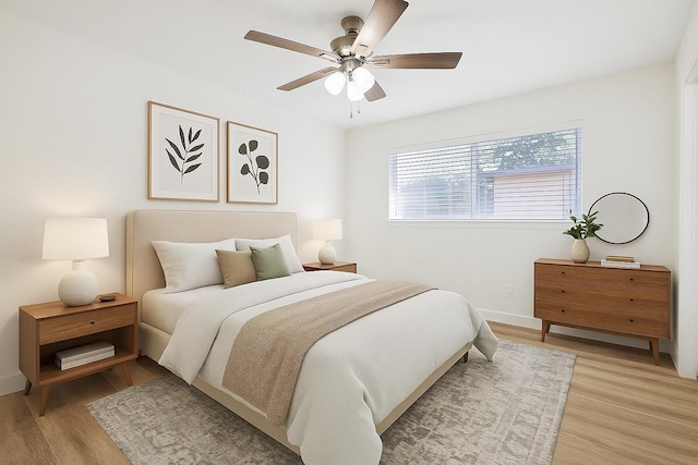 1907 Nevada St, Denton, TX 76209 - bedroom with light wood-style flooring, baseboards, and a ceiling fan