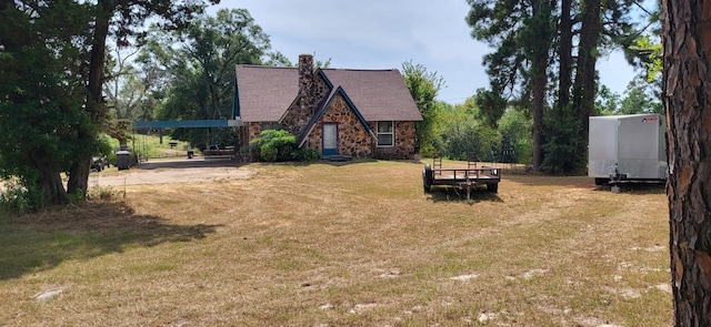 view of yard with a carport