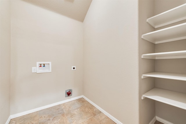 clothes washing area with washer hookup, laundry area, hookup for an electric dryer, and baseboards