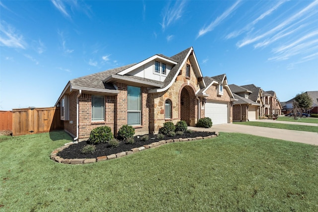 view of front of home with a garage, driveway, brick siding, and a front yard