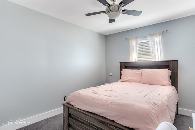 bedroom with carpet floors, baseboards, and a ceiling fan