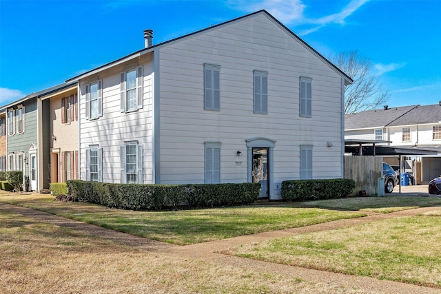 view of front of house featuring a front lawn