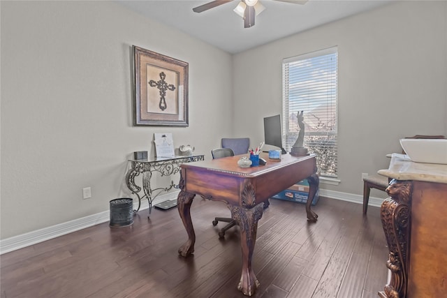 office space featuring ceiling fan, wood finished floors, and baseboards