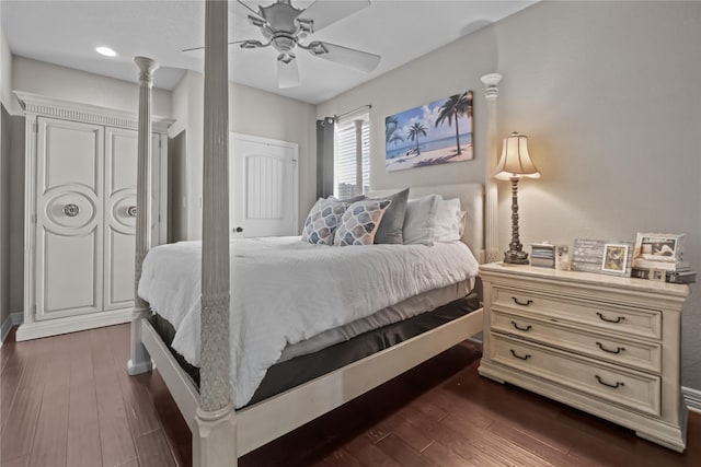 bedroom featuring a ceiling fan and dark wood finished floors