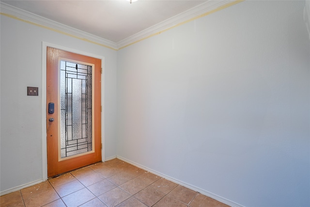 entrance foyer with light tile patterned floors, ornamental molding, and baseboards