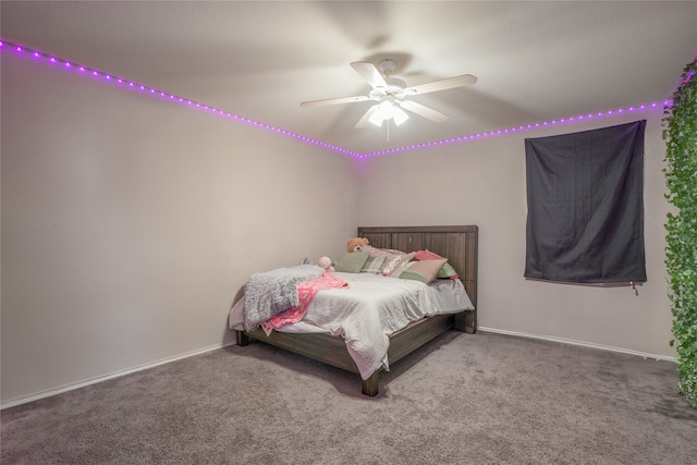 bedroom featuring carpet, ceiling fan, and baseboards