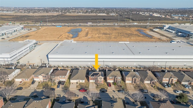 birds eye view of property with a residential view