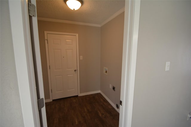 interior space featuring baseboards, a textured ceiling, ornamental molding, and dark wood-style flooring