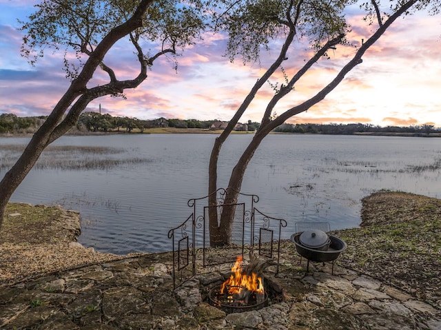 view of water feature featuring a fire pit