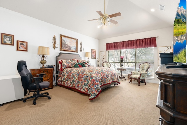 carpeted bedroom with a ceiling fan, visible vents, and vaulted ceiling