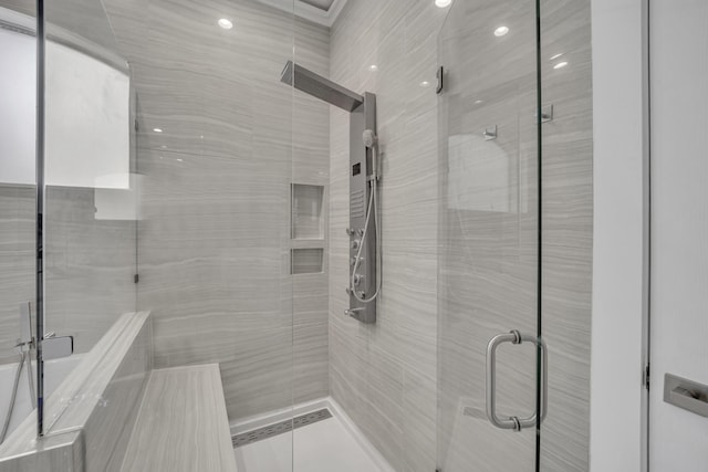 bathroom featuring a shower stall