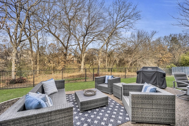 view of patio / terrace featuring an outdoor living space with a fire pit, a fenced backyard, and area for grilling