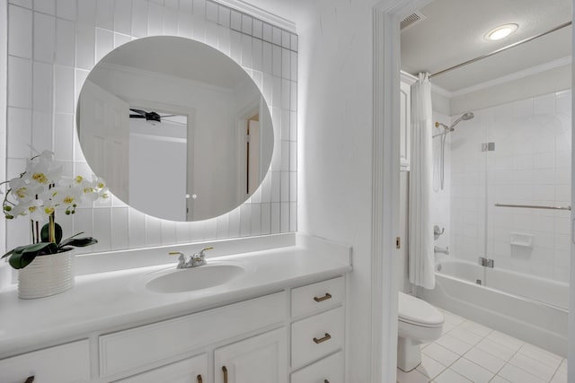 full bathroom with shower / tub combo with curtain, toilet, a ceiling fan, vanity, and tile patterned floors