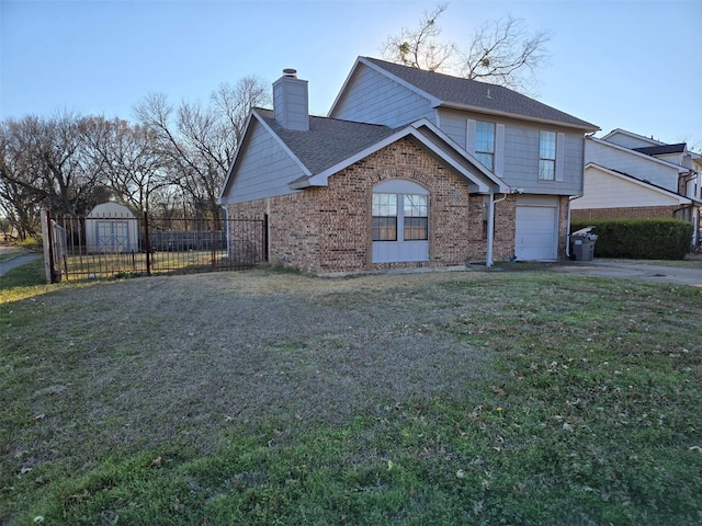 view of front of home with brick siding, an attached garage, fence, driveway, and a front lawn