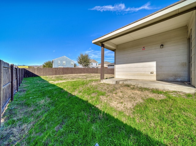 view of yard featuring a fenced backyard