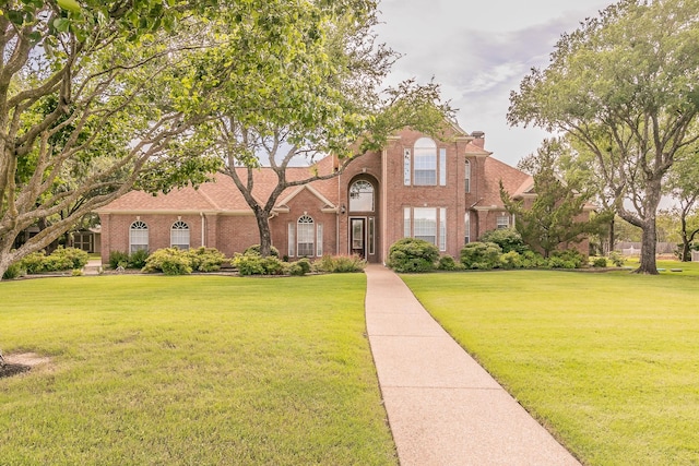 128 Oakview Dr, Hudson Oaks, TX 76087 - view of front of house with a front lawn and brick siding