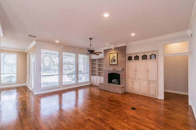 128 Oakview Dr, Hudson Oaks, TX 76087 - unfurnished living room featuring a ceiling fan, a fireplace, ornamental molding, dark wood-style flooring, and baseboards