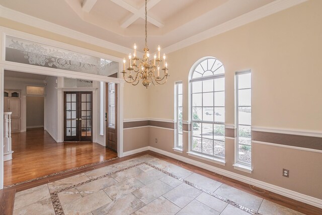 128 Oakview Dr, Hudson Oaks, TX 76087 - unfurnished dining area with inlaid floor details, healthy amount of natural light, coffered ceiling, ornamental molding, and a chandelier