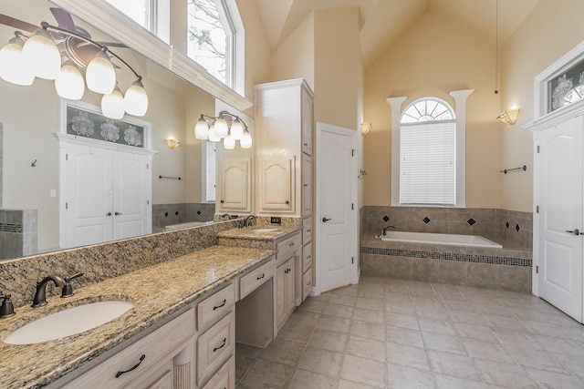 128 Oakview Dr, Hudson Oaks, TX 76087 - full bathroom with a towering ceiling, a garden tub, and double vanity