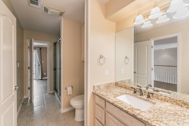 128 Oakview Dr, Hudson Oaks, TX 76087 - full bathroom featuring a shower stall, toilet, vanity, tile patterned floors, and baseboards