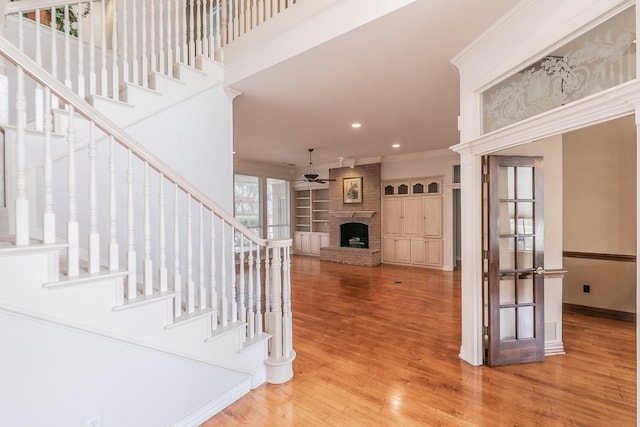 128 Oakview Dr, Hudson Oaks, TX 76087 - entrance foyer featuring stairway, ceiling fan, recessed lighting, wood finished floors, and ornamental molding