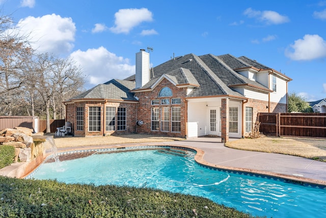 view of pool featuring a patio, fence, and a fenced in pool