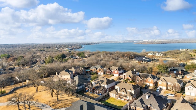 aerial view featuring a water view and a residential view