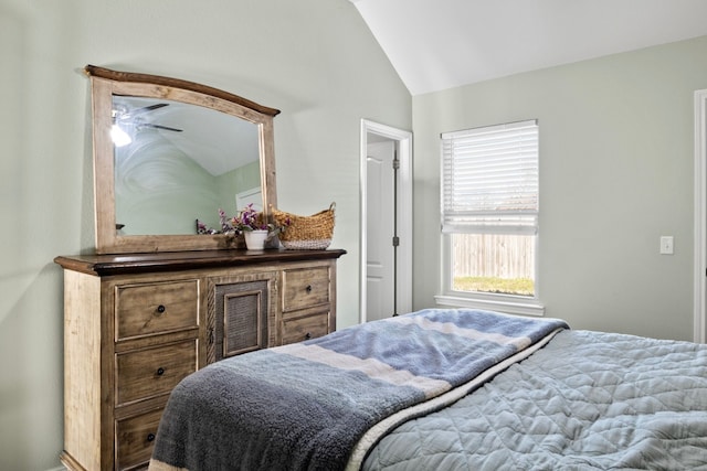 bedroom featuring lofted ceiling