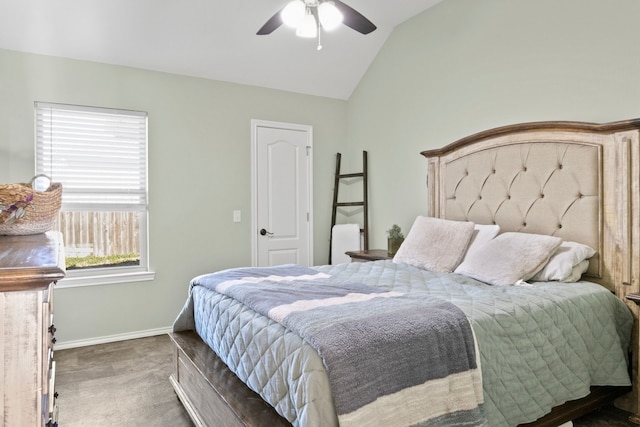 bedroom with vaulted ceiling, carpet floors, a ceiling fan, and baseboards