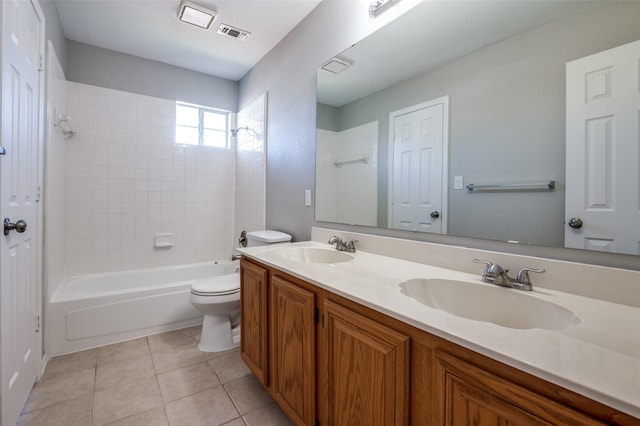 full bathroom with visible vents, a sink, toilet, and tile patterned floors