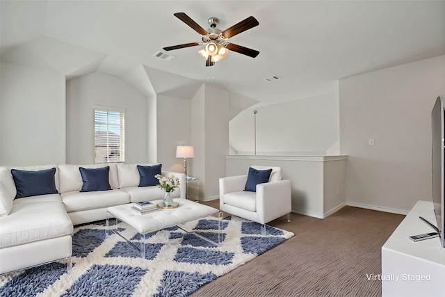 living area with lofted ceiling, baseboards, visible vents, and a ceiling fan