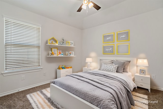 bedroom with carpet floors, ceiling fan, and baseboards