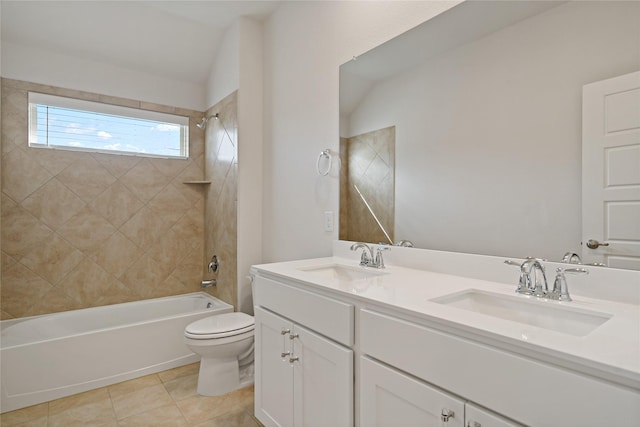 full bathroom featuring double vanity, shower / bath combination, a sink, and toilet