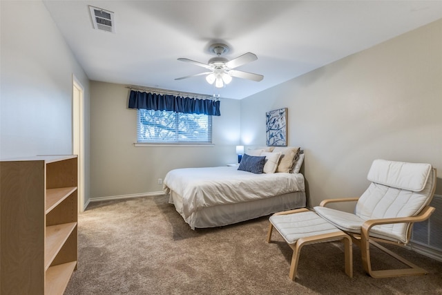 bedroom featuring ceiling fan, carpet floors, visible vents, and baseboards