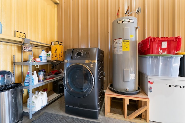 laundry room with washer / dryer, laundry area, and water heater