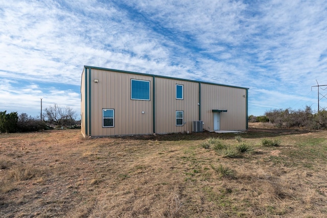 exterior space with central air condition unit