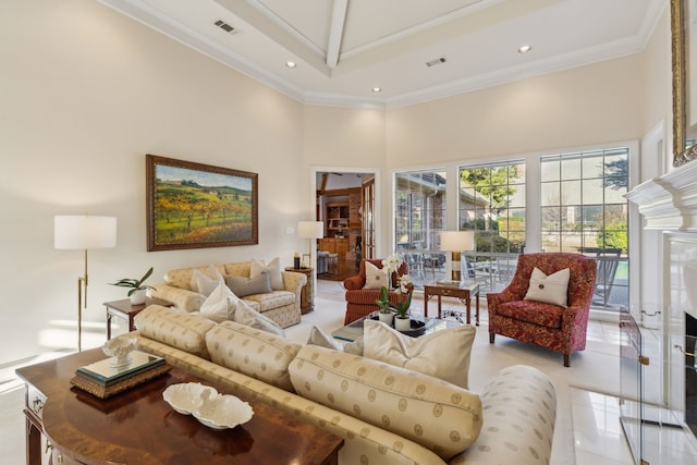 living room with visible vents, a high ceiling, crown molding, a fireplace, and recessed lighting