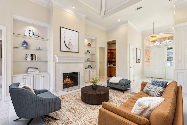 21 Canyon Crest Ct, Frisco, TX 75034 - living room with built in features, recessed lighting, a tile fireplace, baseboards, and ornamental molding