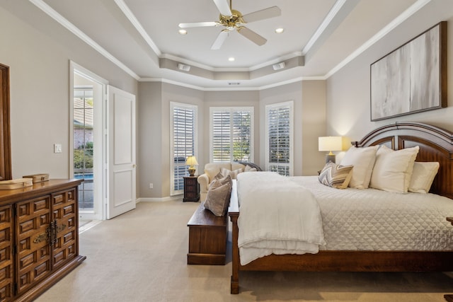 bedroom featuring access to outside, a raised ceiling, multiple windows, and crown molding