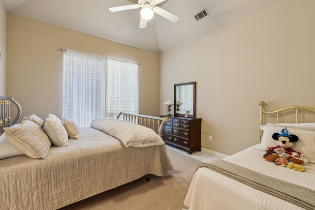 bedroom with light carpet, baseboards, visible vents, a ceiling fan, and vaulted ceiling