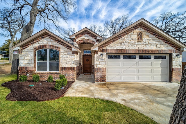 view of front of home with an attached garage, brick siding, stone siding, driveway, and a front yard