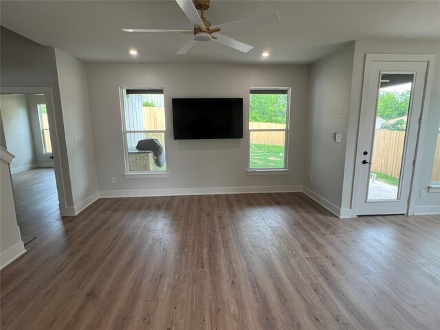3244 Crites St, Richland Hills, TX 76118 - unfurnished living room with plenty of natural light, baseboards, and recessed lighting