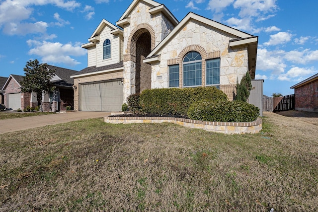 view of front facade featuring a garage, stone siding, a front lawn, and concrete driveway