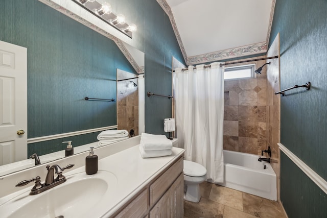 bathroom with vanity, toilet, and shower / tub combo with curtain